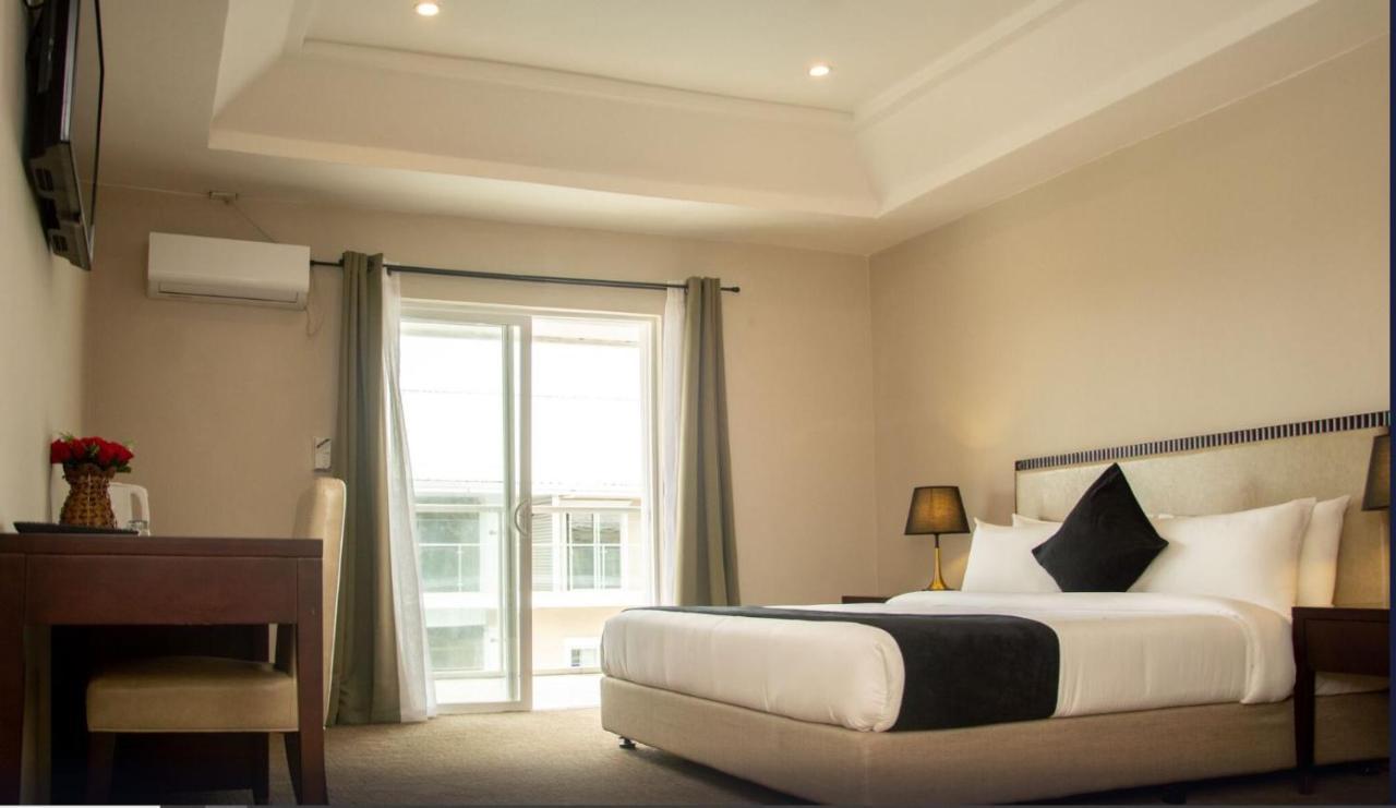 Royal Ambassador Hotel Harbel エクステリア 写真